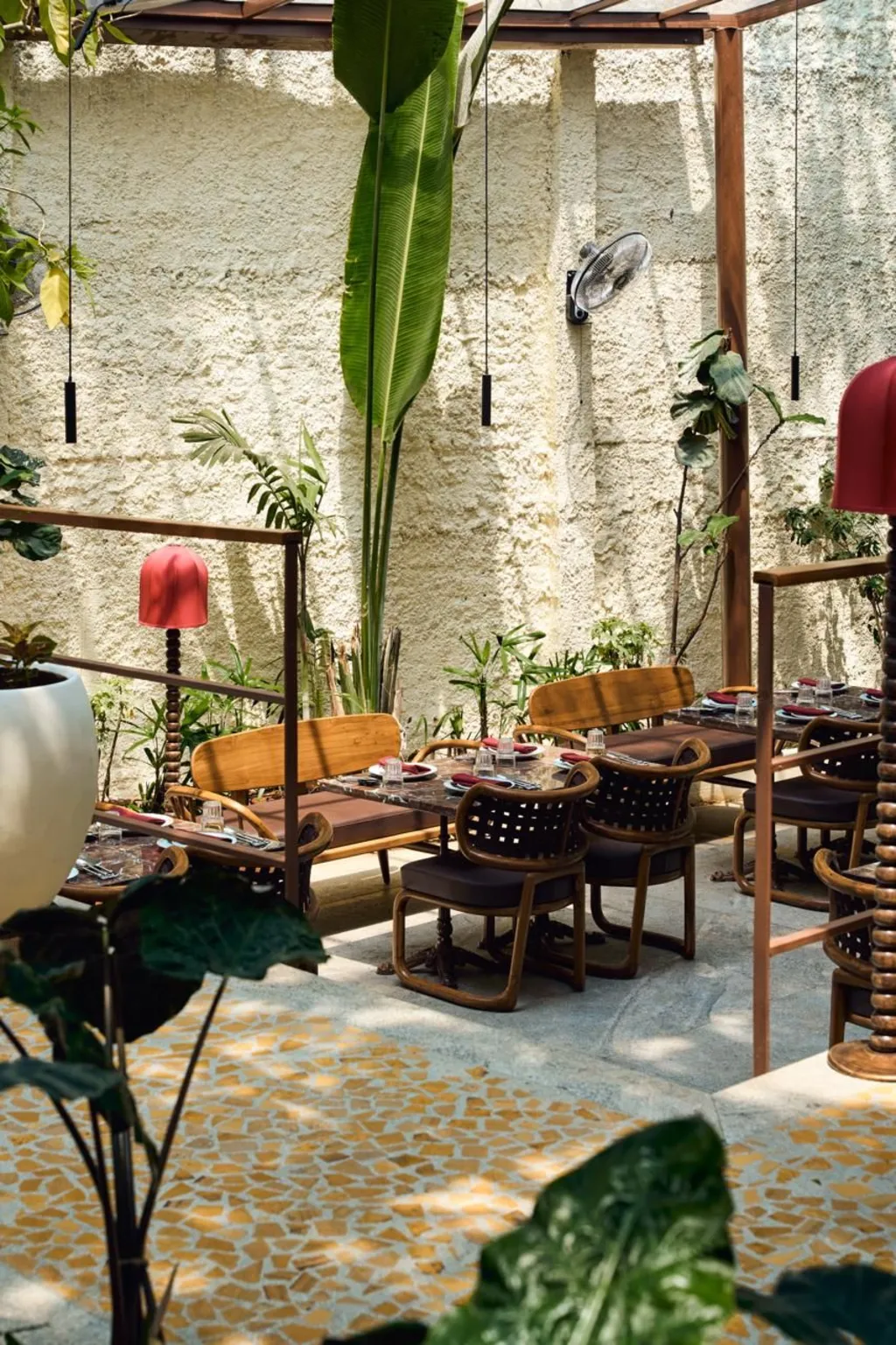 Low-lit lounge with plush banquette seating and intimate atmosphere